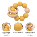 Organisches 15mm Bpa-freies Holz-Großhandelsrundes Silikon-Perlen-Ring-Spielzeug für Baby-Kinderkrankheiten-Armband